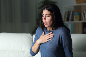 Woman Struggling to Breathe