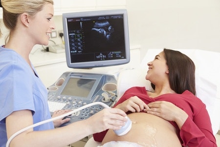 pregnant woman having 4d ultrasound scan